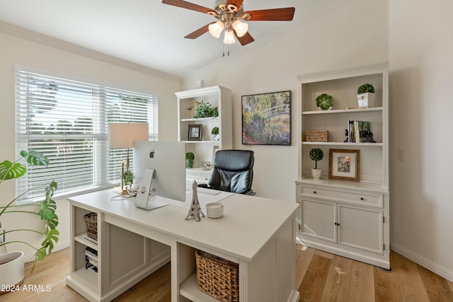 office with ceiling fan, ornamental molding, and light hardwood / wood-style flooring