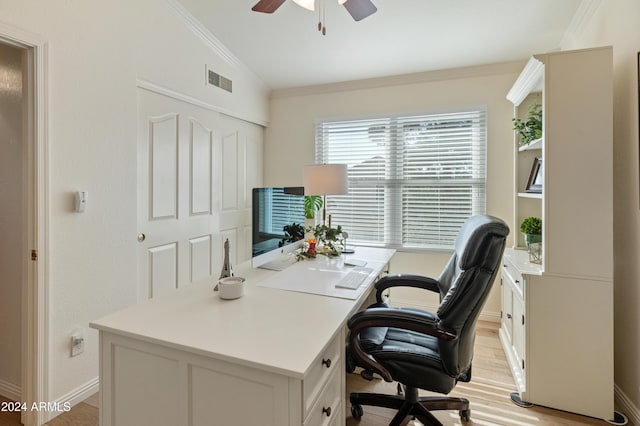 office area featuring lofted ceiling, light hardwood / wood-style floors, ceiling fan, and ornamental molding