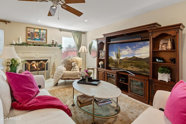 living room with light tile patterned floors and ceiling fan