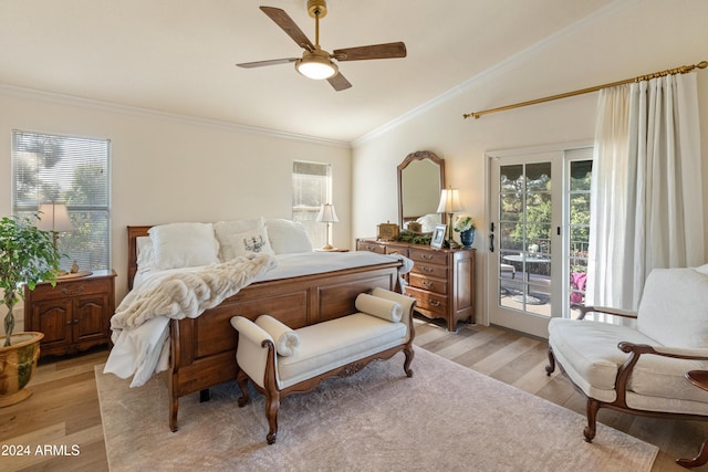 bedroom with ceiling fan, light hardwood / wood-style floors, lofted ceiling, access to outside, and multiple windows