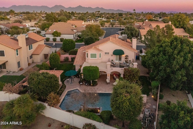 view of aerial view at dusk