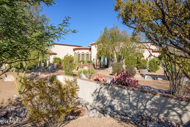 view of front of home with stucco siding