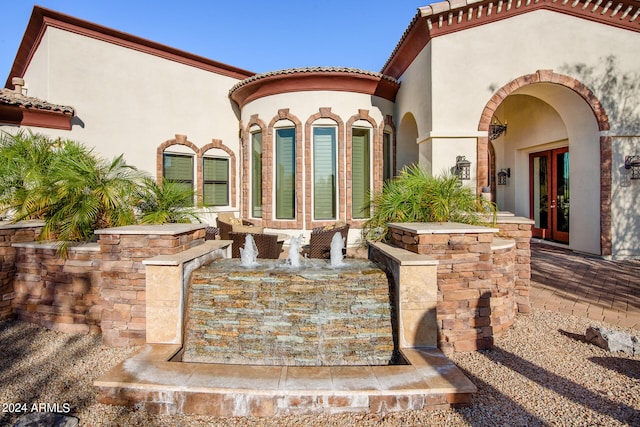 view of patio featuring french doors