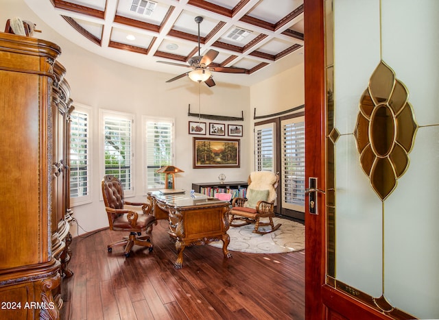 office with beam ceiling, hardwood / wood-style floors, coffered ceiling, and ceiling fan