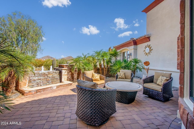 view of patio featuring a mountain view