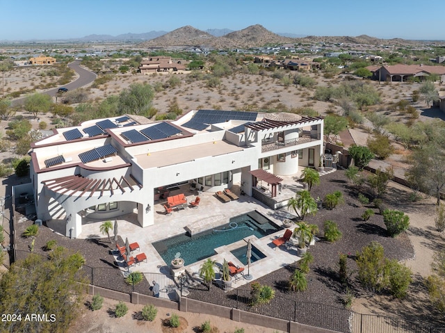 bird's eye view with a mountain view