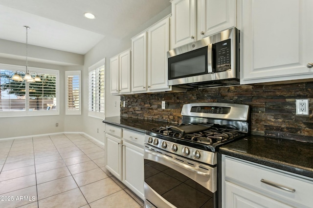 kitchen featuring white cabinetry and stainless steel appliances