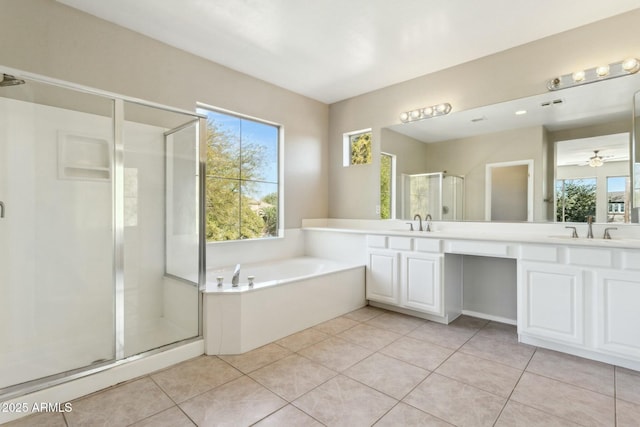 bathroom with independent shower and bath, vanity, tile patterned floors, and ceiling fan