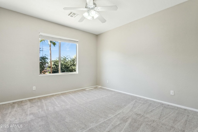 carpeted empty room with ceiling fan