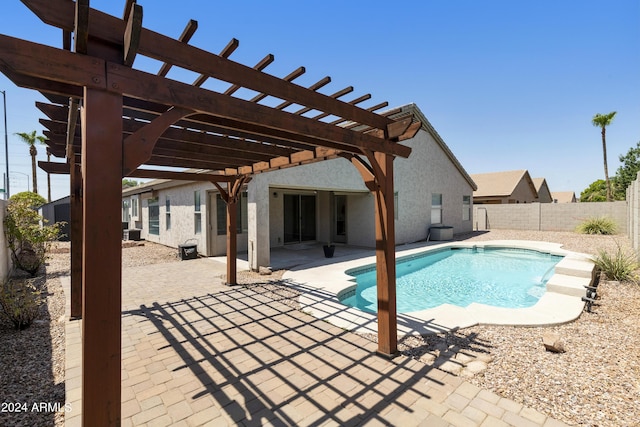 view of side of home with fence and stucco siding