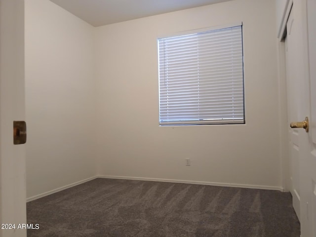 1970 W Park Pl, Chandler, AZ 85224 - spare room with dark colored carpet and baseboards