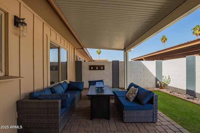 view of patio with an outdoor hangout area and a fenced backyard