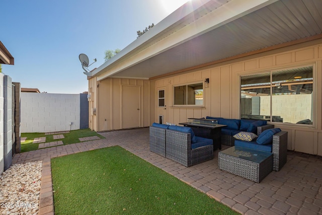 view of patio featuring fence and an outdoor living space