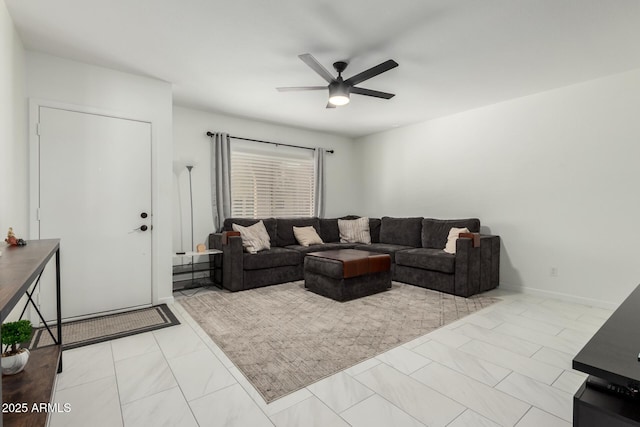 living area featuring ceiling fan