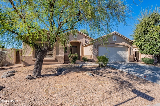 view of front of property featuring a garage