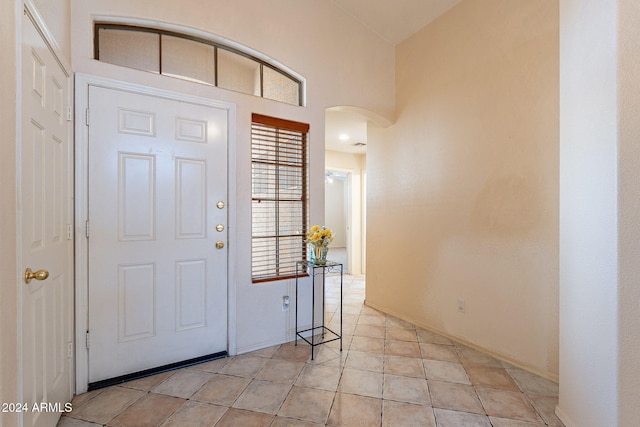 foyer entrance featuring light tile patterned floors