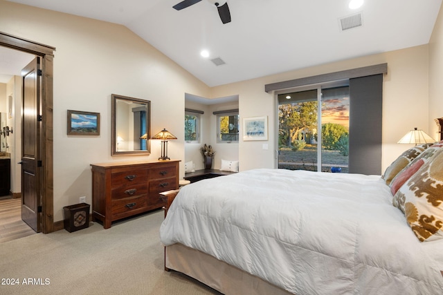 bedroom featuring light hardwood / wood-style flooring, access to outside, vaulted ceiling, and ceiling fan