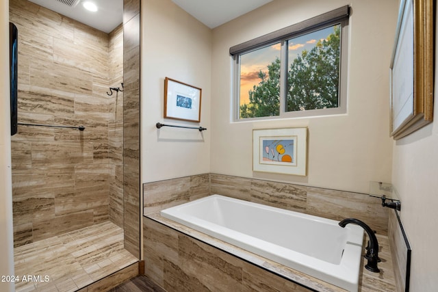 bathroom with plus walk in shower