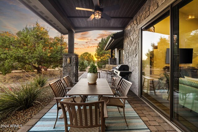 balcony with a patio, area for grilling, and ceiling fan