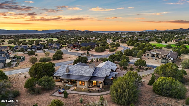 aerial view at dusk with a mountain view