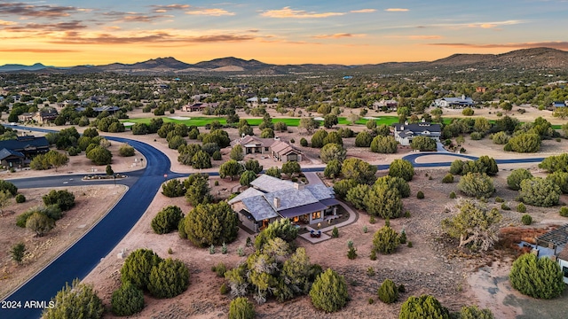 aerial view at dusk with a mountain view