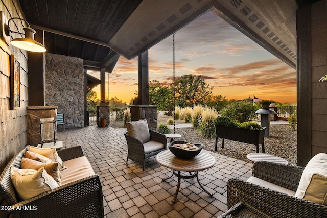 patio terrace at dusk with outdoor lounge area