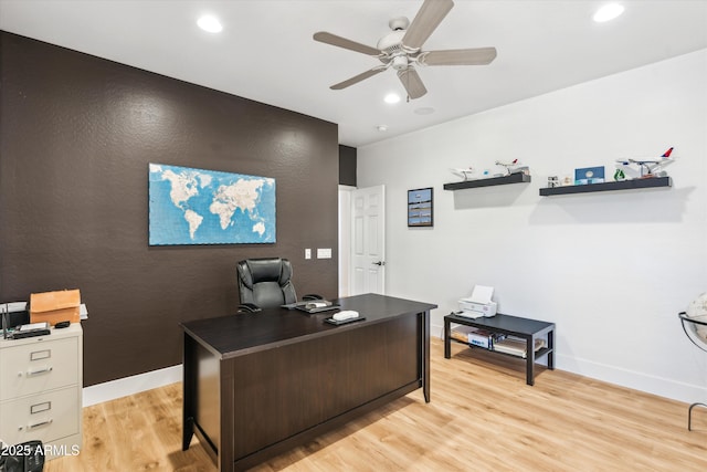 office area featuring ceiling fan, baseboards, light wood-style flooring, and recessed lighting