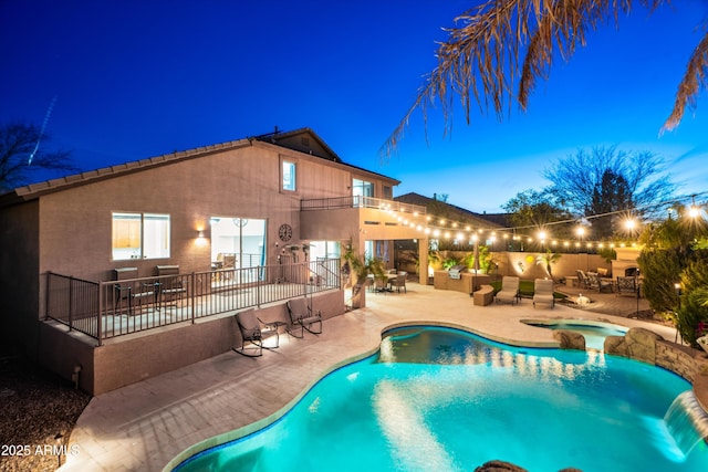 view of pool featuring outdoor dining space, a patio, fence, and an outdoor hangout area