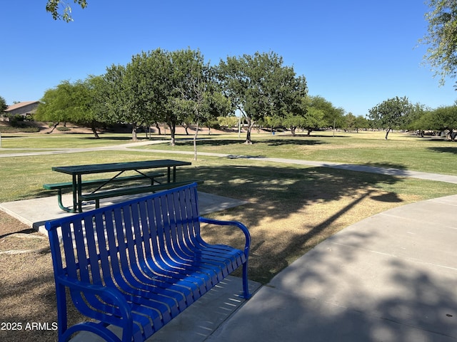 view of home's community featuring a yard