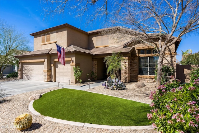 view of front of house with driveway, an attached garage, stucco siding, a front lawn, and stone siding