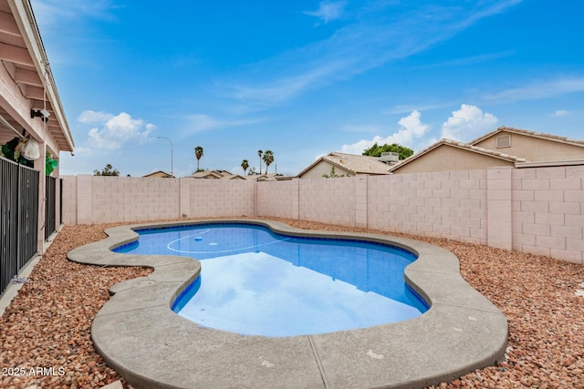 view of pool with a fenced in pool and a fenced backyard