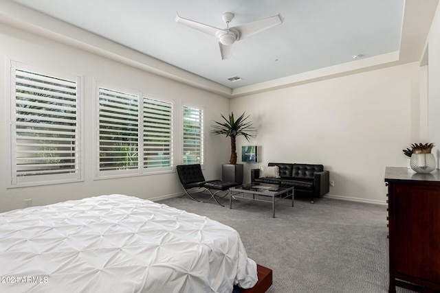 bedroom with light carpet and ceiling fan