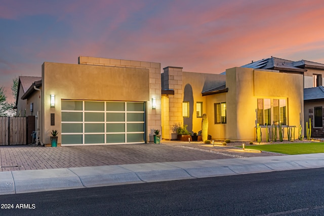 modern home featuring a garage