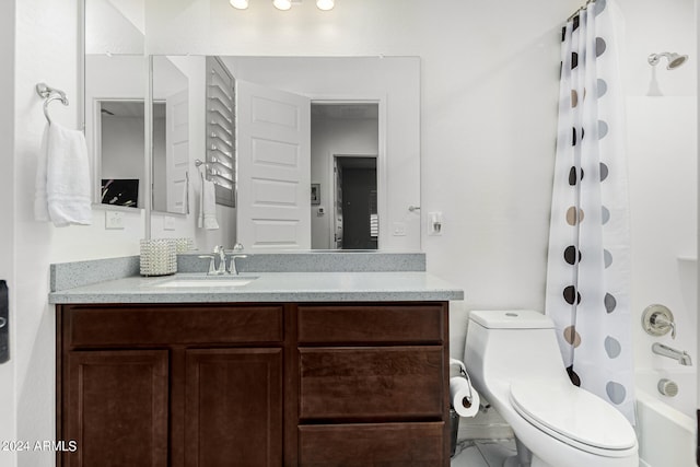 full bathroom featuring toilet, shower / tub combo, and vanity