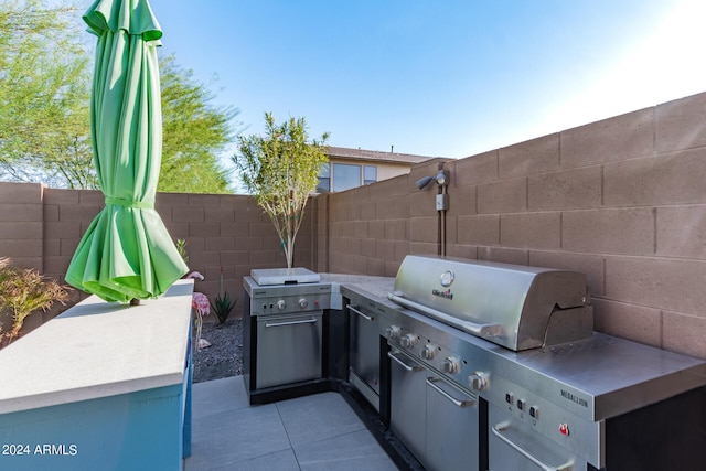 view of patio / terrace featuring a grill