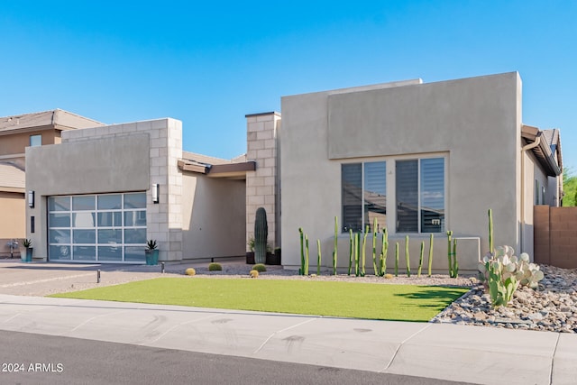 view of front of home with a front lawn