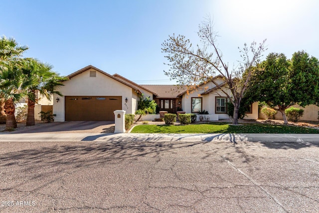 ranch-style house featuring a garage