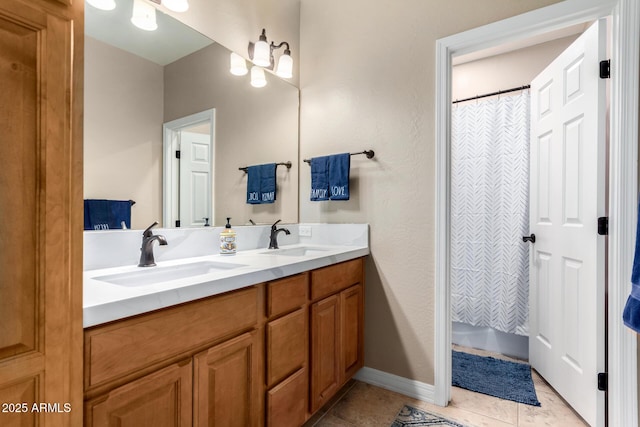 bathroom featuring vanity and tile patterned flooring