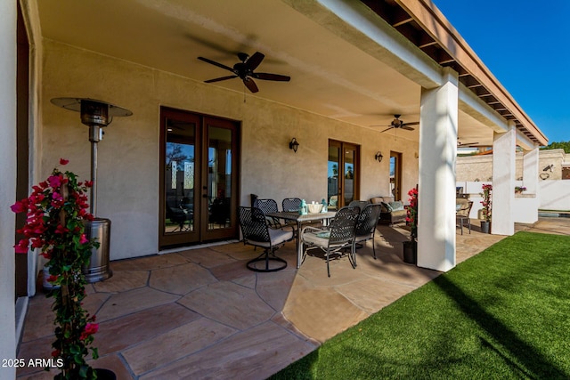 view of patio / terrace with ceiling fan and french doors