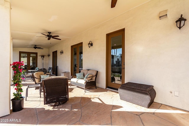 view of patio with french doors and ceiling fan