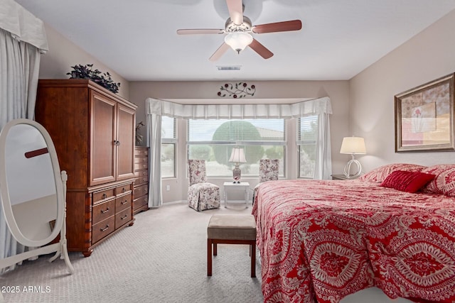 19722 N Regents Park Dr, Surprise, AZ 85387 - bedroom with light carpet and ceiling fan