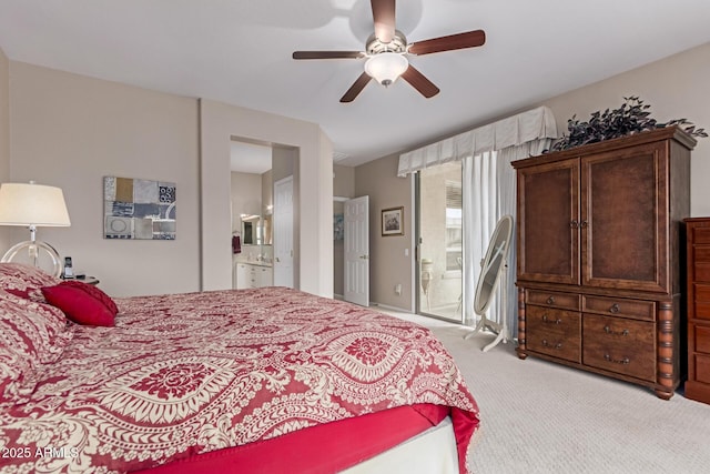 19722 N Regents Park Dr, Surprise, AZ 85387 - bedroom featuring carpet floors, connected bathroom, and ceiling fan