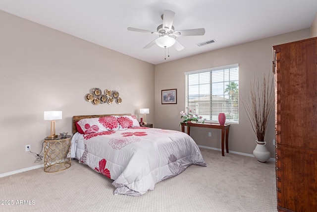 19722 N Regents Park Dr, Surprise, AZ 85387 - carpeted bedroom with baseboards and ceiling fan