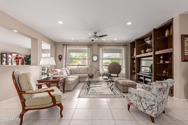 19722 N Regents Park Dr, Surprise, AZ 85387 - living area featuring a ceiling fan, recessed lighting, light tile patterned floors, and baseboards