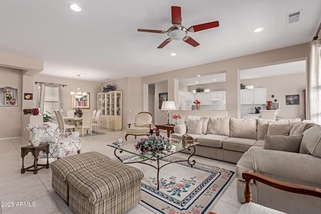 19722 N Regents Park Dr, Surprise, AZ 85387 - living room featuring light tile patterned flooring, ceiling fan, recessed lighting, and a chandelier