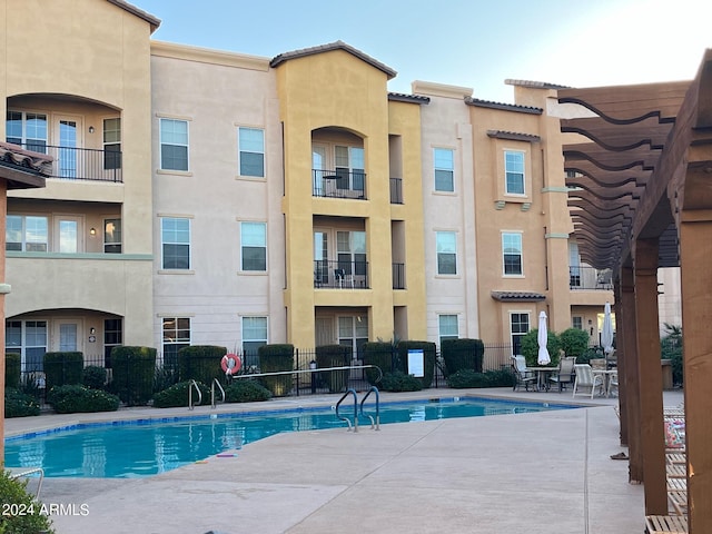 view of pool featuring a patio area