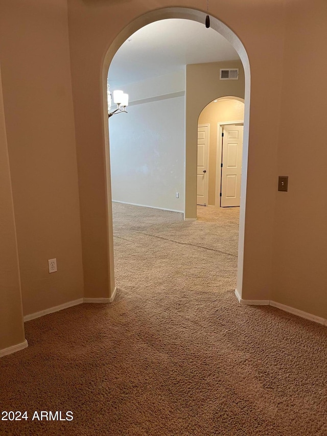 hallway with carpet