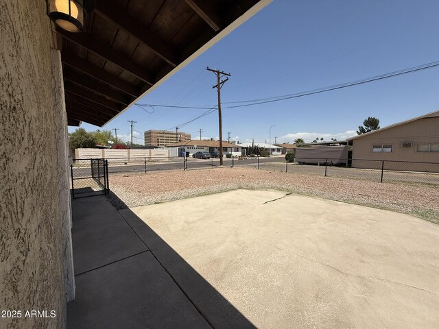 view of patio with fence