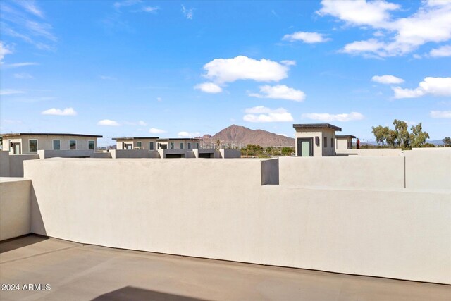 view of patio / terrace with a mountain view