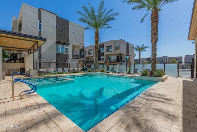 view of swimming pool featuring a patio